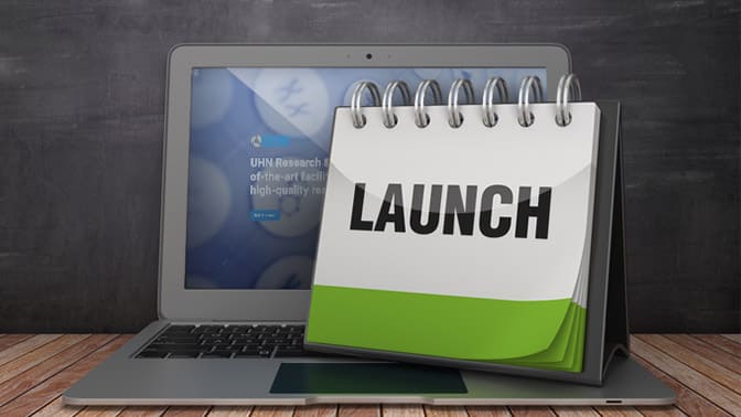 photo of a laptop and launch sign